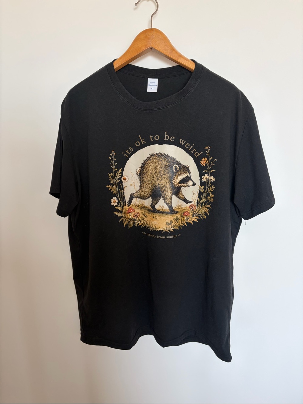Jimothy raccoon whimsical t-shirt black cotton t-shirt